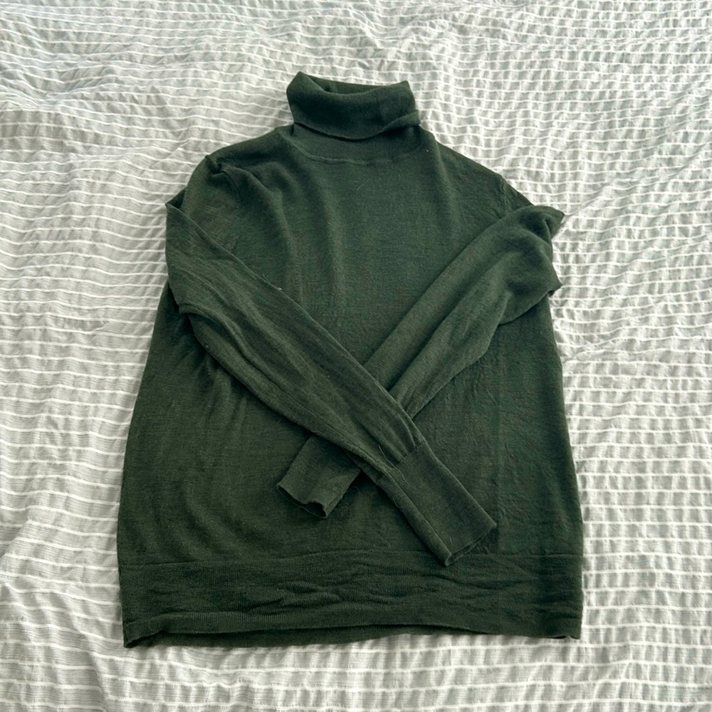 Green turtleneck sweater. Size medium.